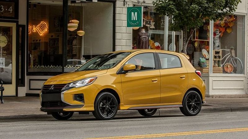 2024 Mitsubishi Mirage parked in front of boutique stores